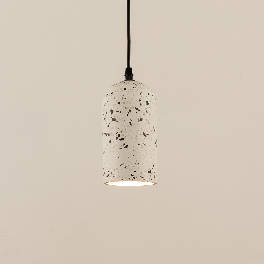 White terrazzo pendant light with black speckled texture crafted for stylish living spaces.