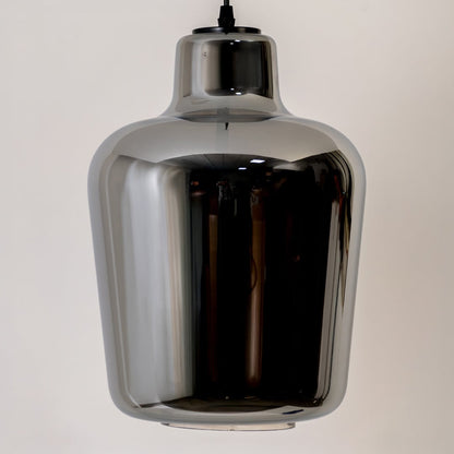 Closeup view of the smoked-glass pendant light showing detailed reflections smooth curved design and premium glossy finish.