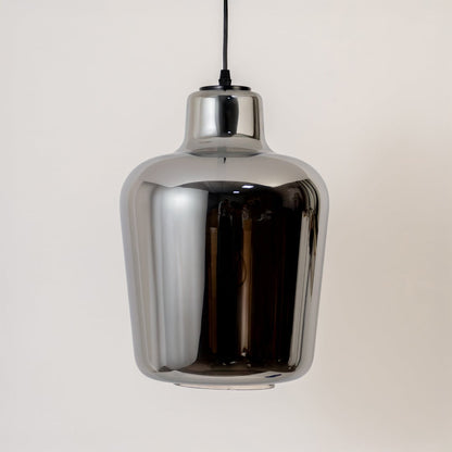 Smoked-glass pendant light turned off against a clean white background emphasizing its glossy reflective body and rounded form.