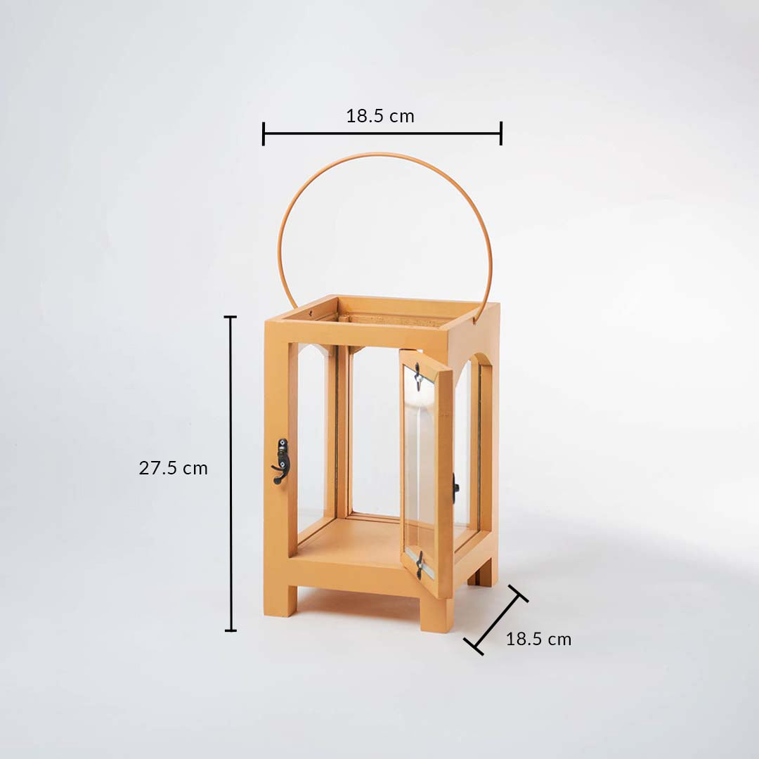 A lantern displayed on a white background with clear measurements showing its height as 27 cm width as 18 cm and depth as 18 cm along with its metal handle arch positioned above the frame.