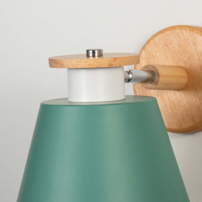 Modern wooden wall sconce with green lampshade light off white background for bedroom study room and hallway stylish decorative wall lighting.
