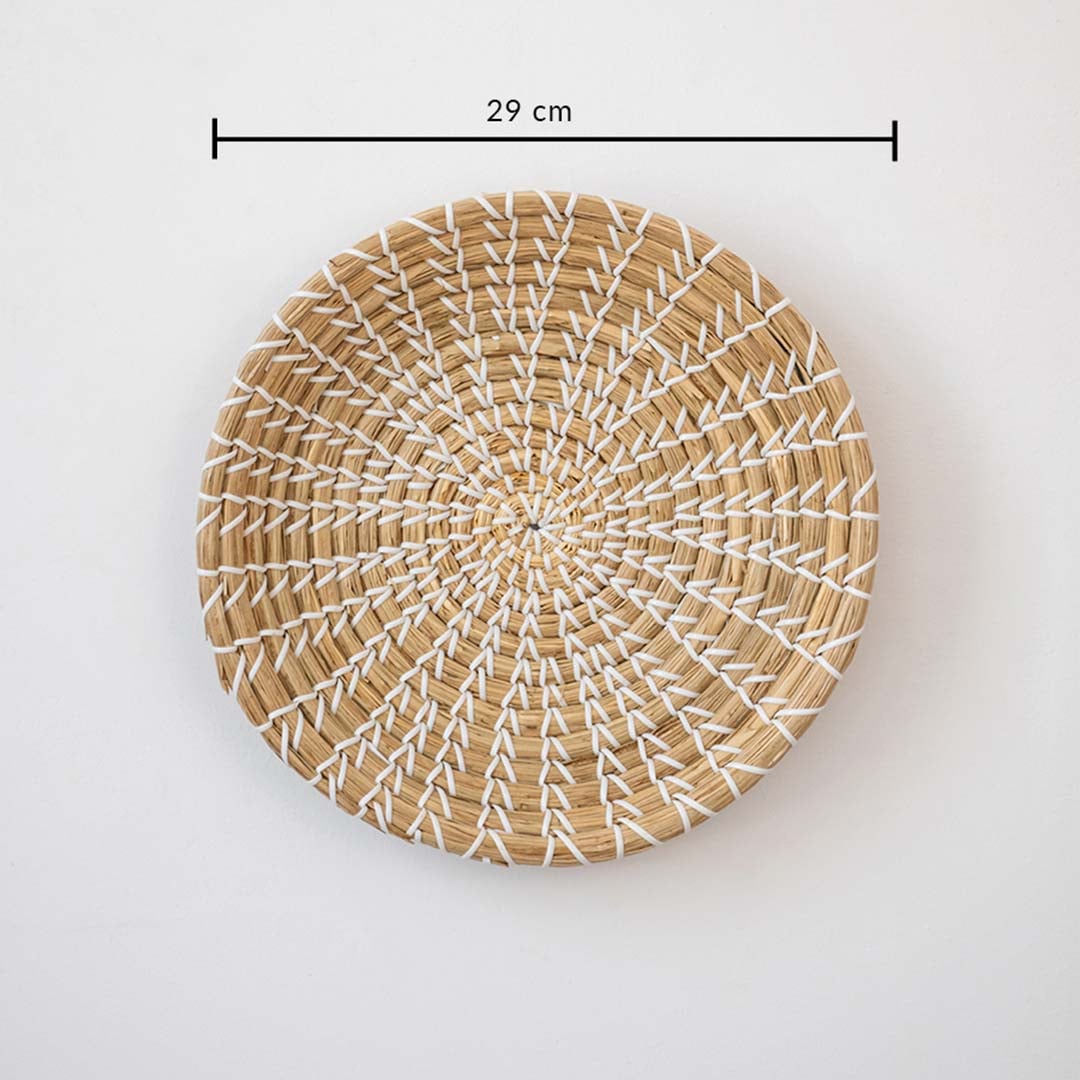 Round handcrafted wall basket in natural beige fiber showing 28 cm diameter suitable for minimal modern wall decor use.
