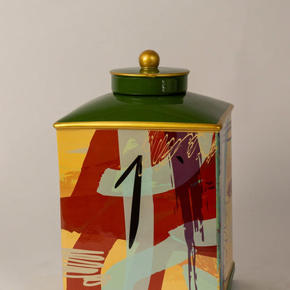 Closeup of abstract design jar showing fine detailing of bold brushstroke patterns and glossy ceramic lid.