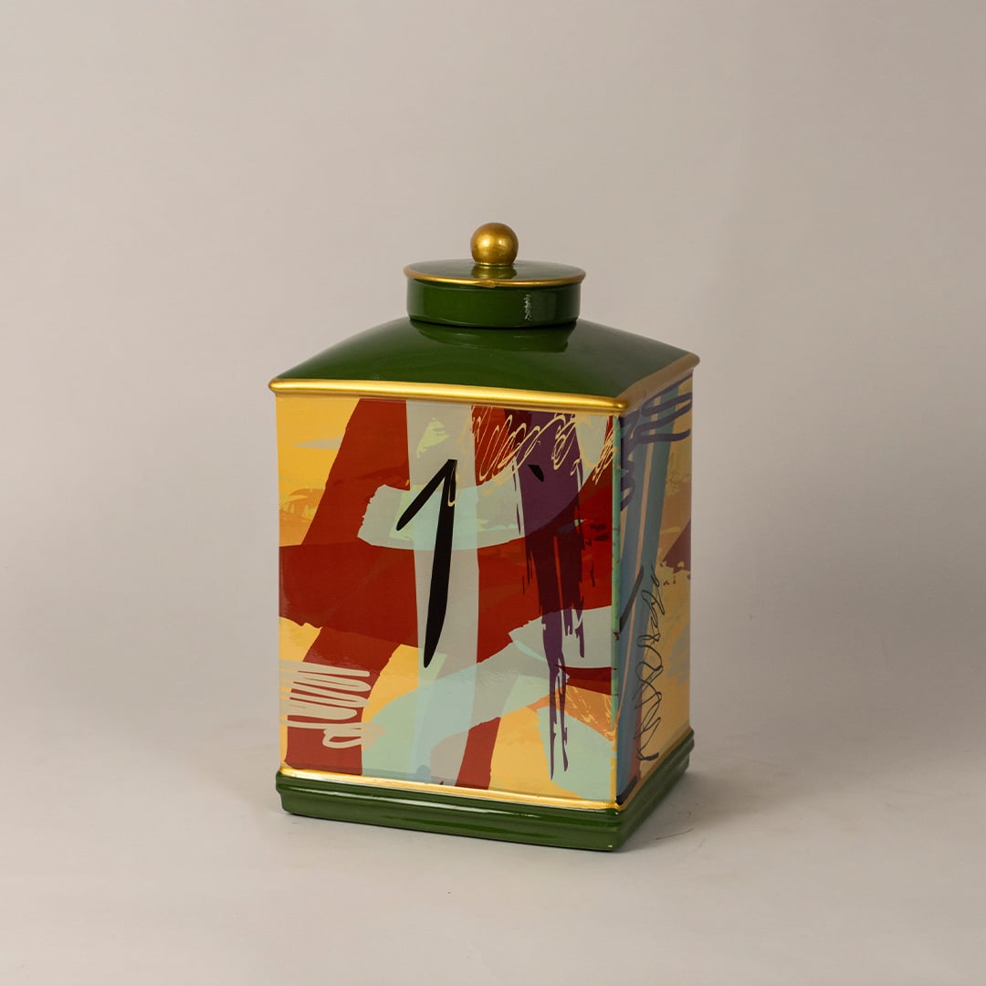 Side angle view of abstract design jar showing curved edges and unique brushstroke patterns with glossy finish.