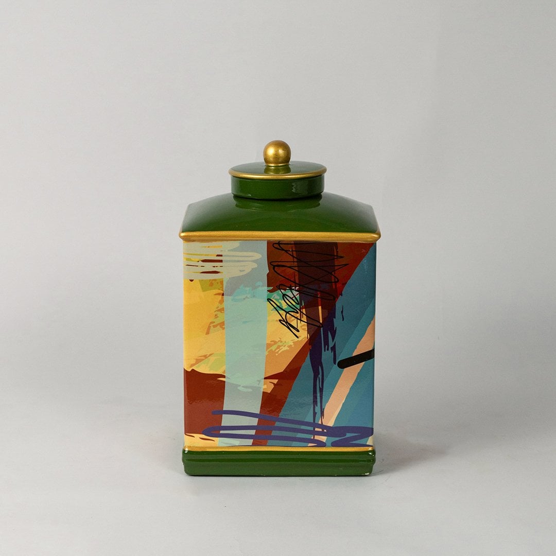 Abstract design jar on white background showcasing its multicolor brushstroke design and glossy ceramic finish.