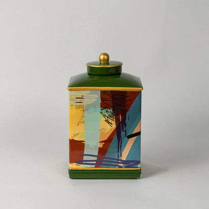 Abstract design jar on white background showcasing its multicolor brushstroke design and glossy ceramic finish.