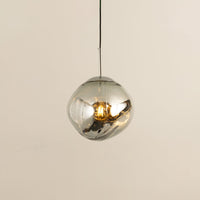 Smoky mirrored glass globe pendant light with reflective finish crafted for elegant modern interiors.