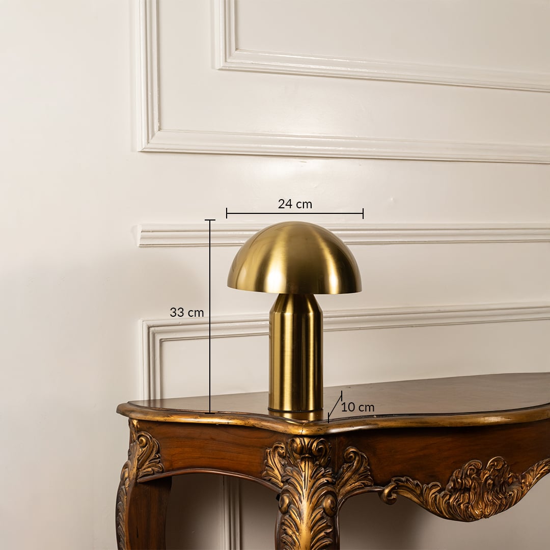 Gold dome table lamp with metallic shade and cylindrical base shown with dimensions of 20 cm width 32 cm height and 20 cm depth ideal for side tables or consoles.