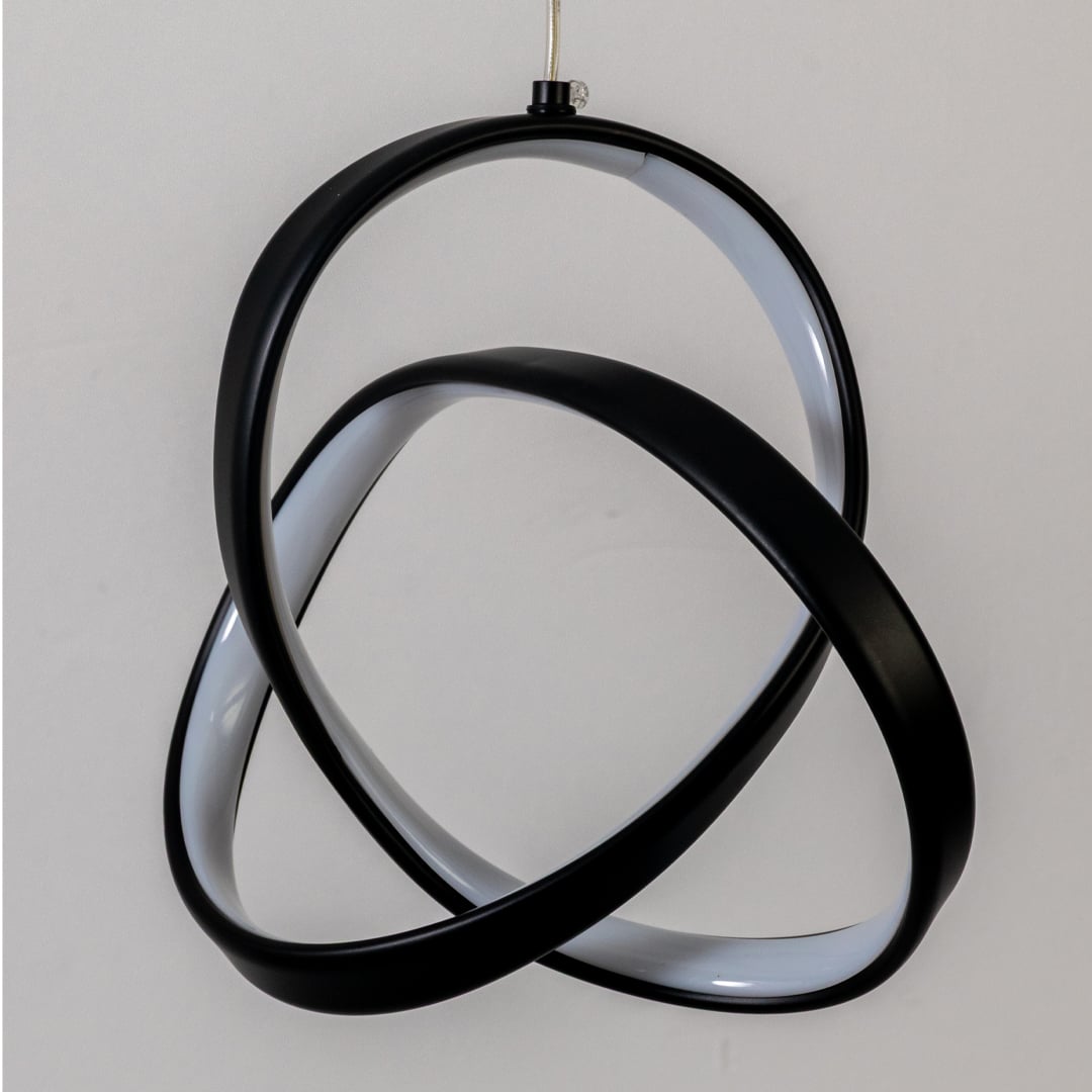 Closeup of black metal LED pendant light highlighting sculptural design and premium finish.