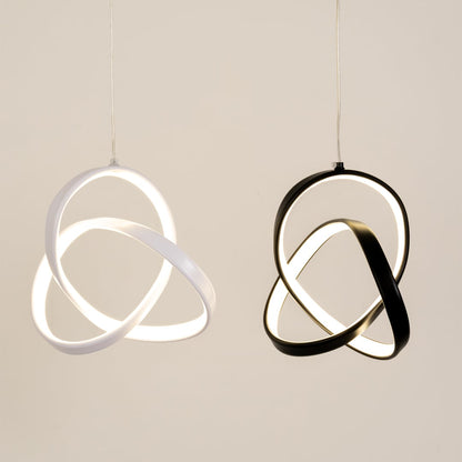 Pair of black and white metal LED pendant lights showcasing artistic modern lighting styles.