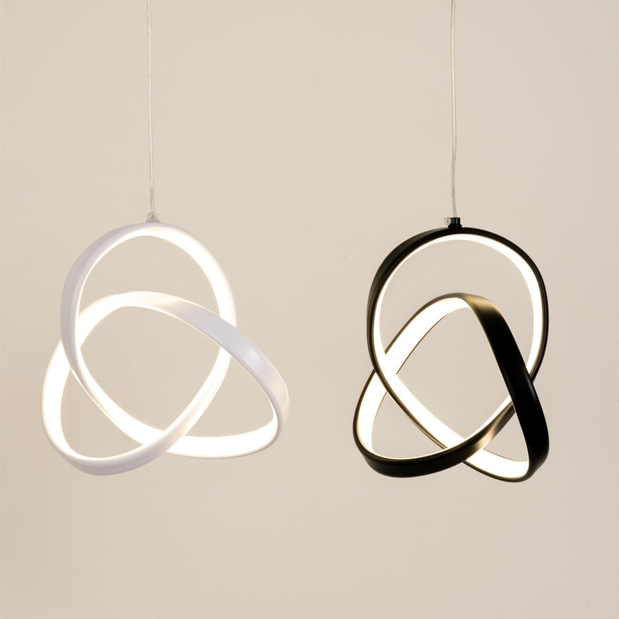 Pair of black and white metal LED pendant lights showcasing artistic modern lighting styles.