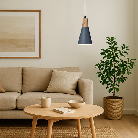 Modern pendant light with wooden top and matte shade styled in living room interior for home lighting.