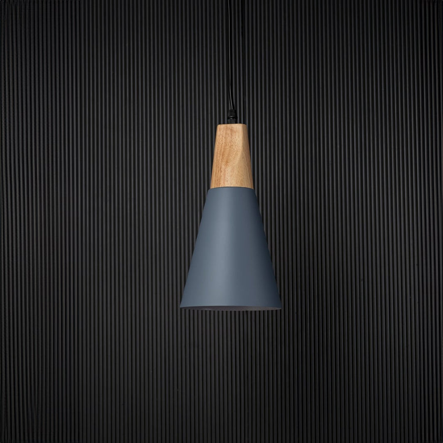 Pendant light with wooden top and matte shade displayed on black background for elegant lighting presentation.