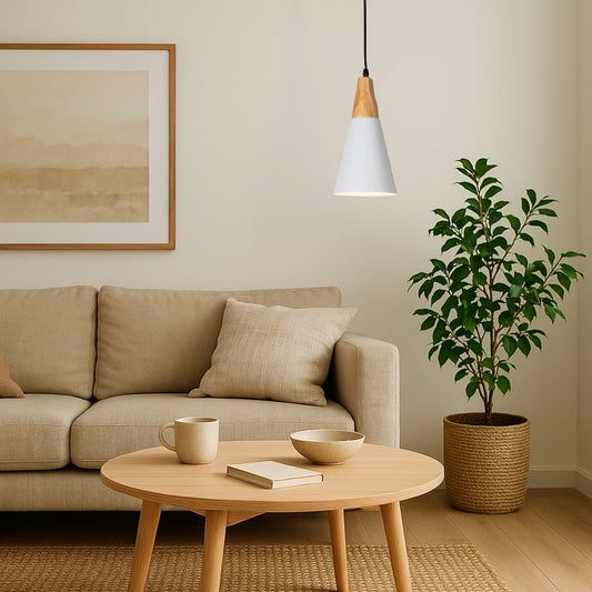 White cone pendant light in a modern living room with minimalist home decor wooden accents and warm lighting.