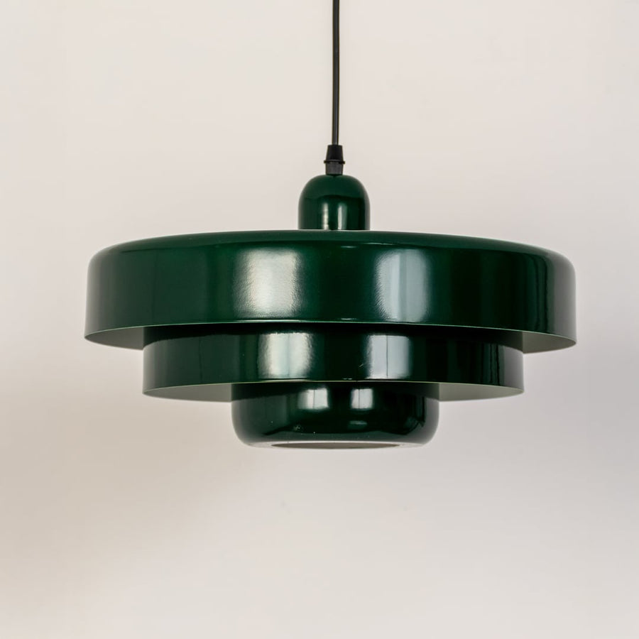 Green metal pendant light with layered profile for dining room kitchen and stylish ceiling decor.