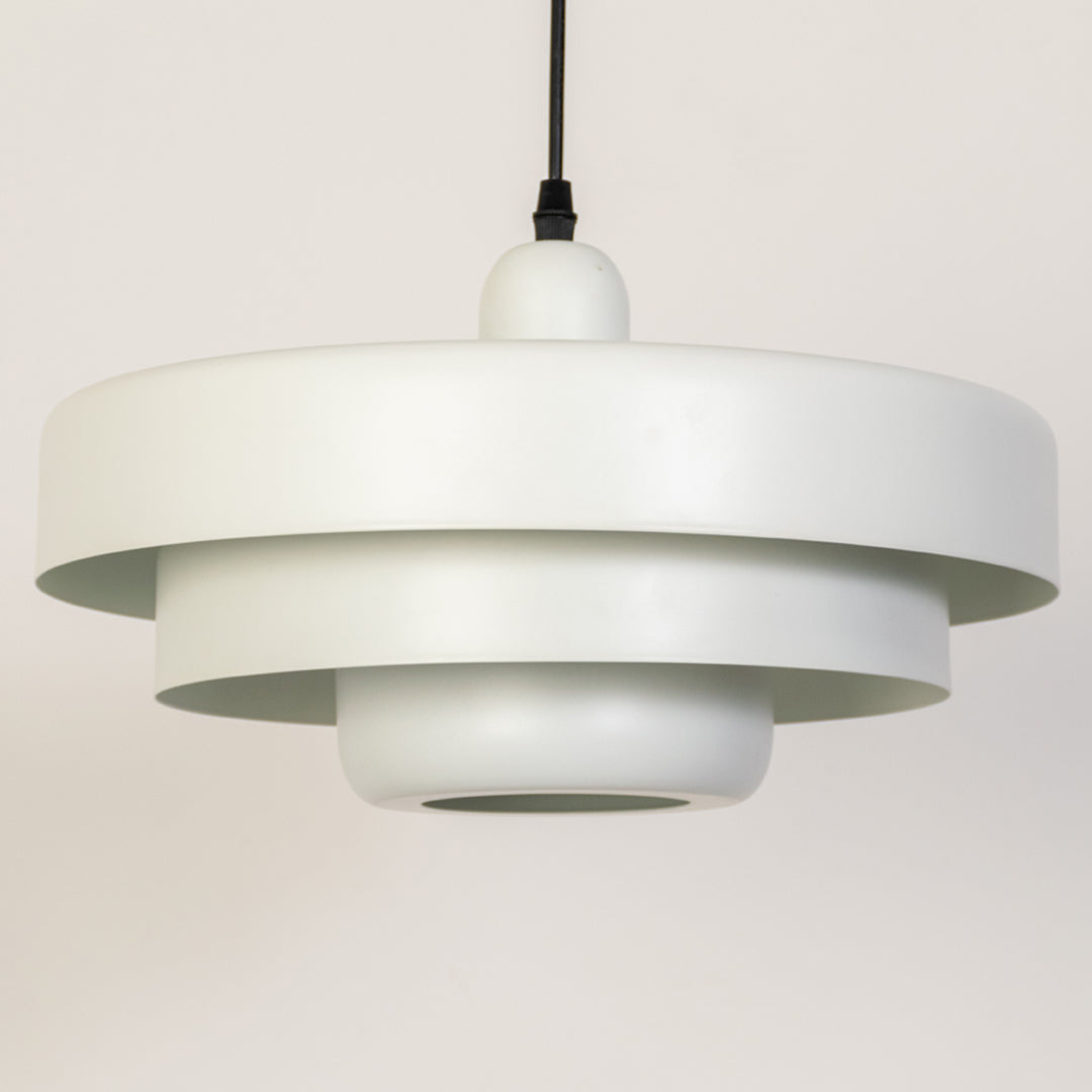 Closeup pendant light in white metal finish with layered shade design for kitchen or dining decor lighting white background.