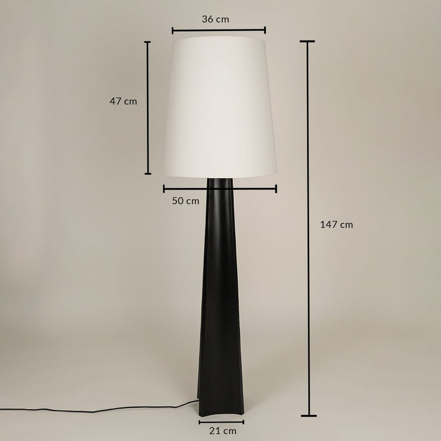 Tall modern floor lamp shown with dimensions of 54 cm width 41 cm shade height and total height of 147 cm creating a warm soft glow.