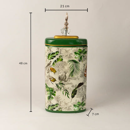 Tropical decorative jar measuring 48 cm height and 21 cm width featuring leaf artwork and golden detailing.