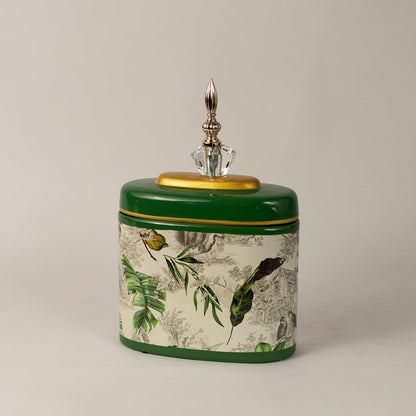 Side view of green tropical jar showing smooth rounded edges  glossy finish  and detailed tropical prints.