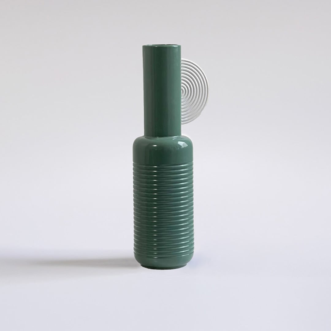 Teal ribbed ceramic vase displayed on a clean white background ideal for modern home decor and stylish contemporary interior accents.