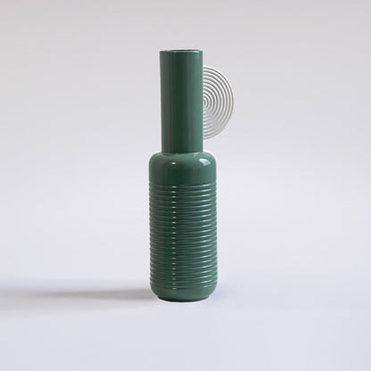 Teal ribbed ceramic vase displayed on a clean white background ideal for modern home decor and stylish contemporary interior accents.