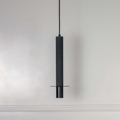 Black cylindrical metal pendant light with polished silver accents crafted for elegant interiors.