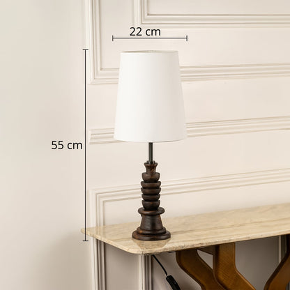 Table lamp shown with 55 cm height and 22 cm shade width featuring a carved dark wooden base and white shade ideal for modern interior home decor lighting.