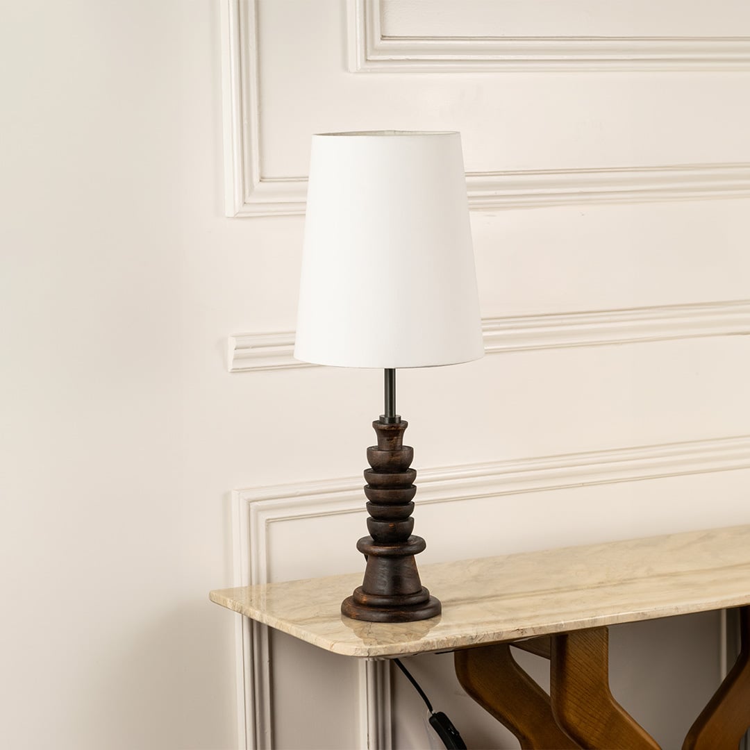 Dark wooden table lamp with white tapered shade shown switched off on a clean white background highlighting its elegant modern shape suited for interior decor.