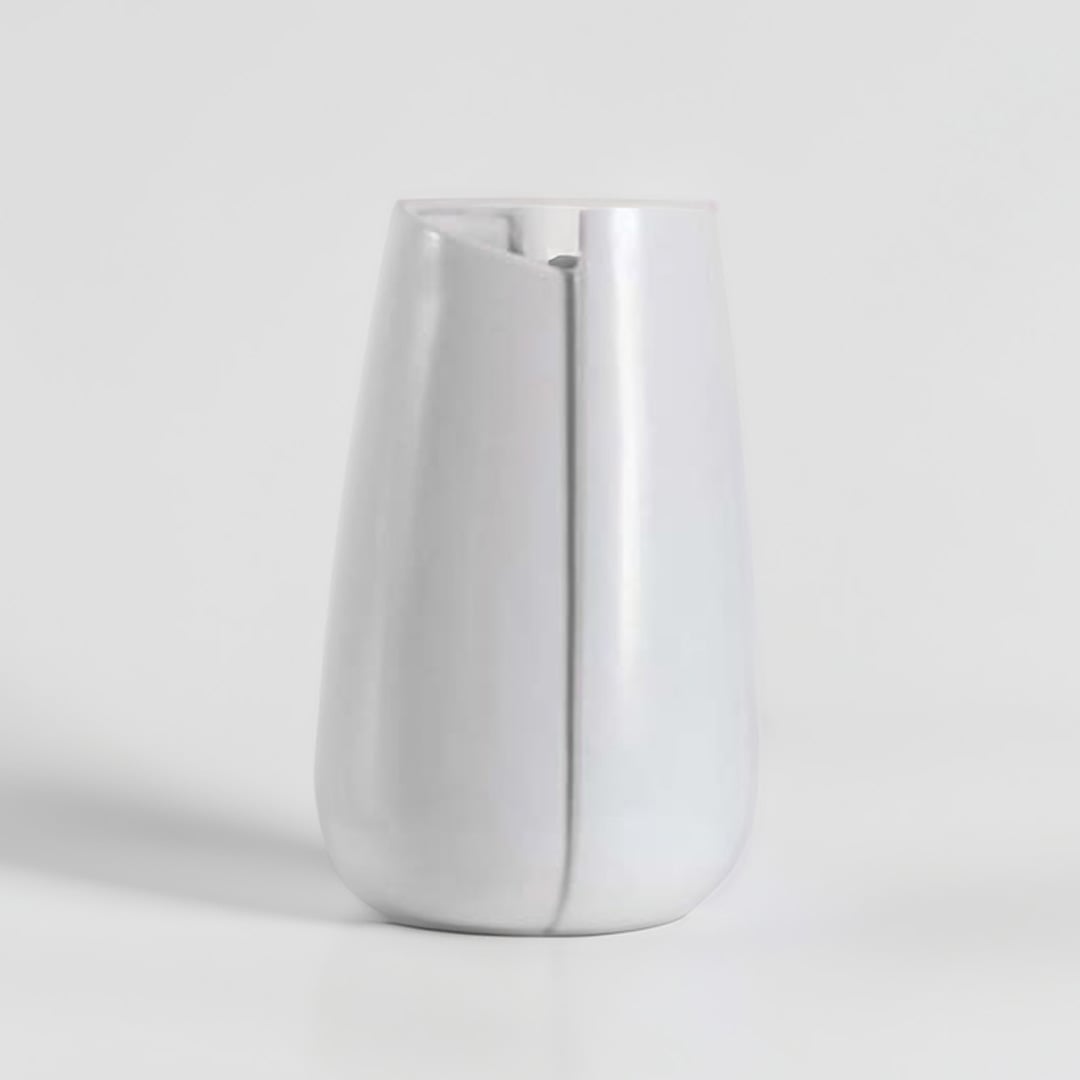 Modern white ceramic vase showcased on a white pedestal with a bright neutral background  emphasizing its simple and refined silhouette.