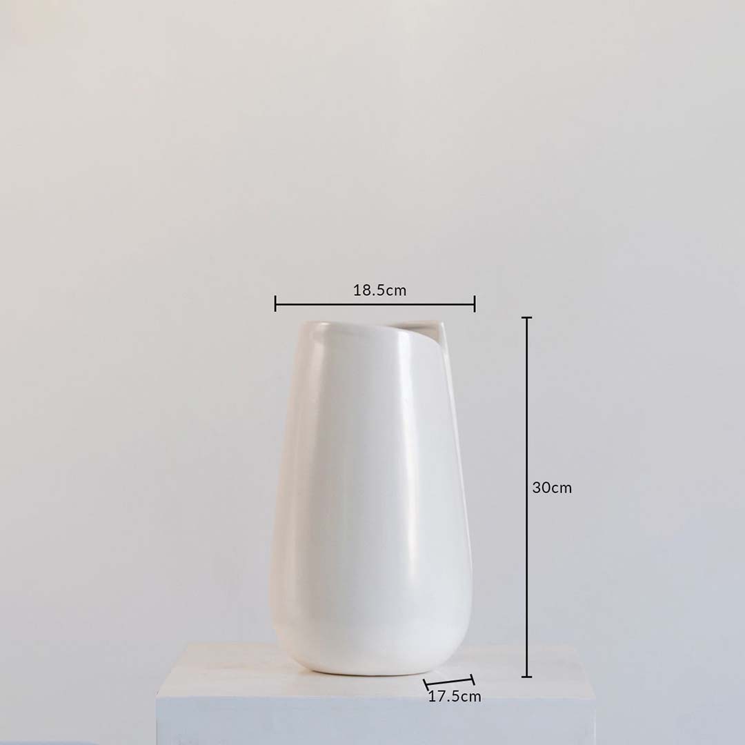 White ceramic vase shown with dimensions 30 cm height  18.5 cm width  and 17.5 cm depth  set against a clean white backdrop for clarity.
