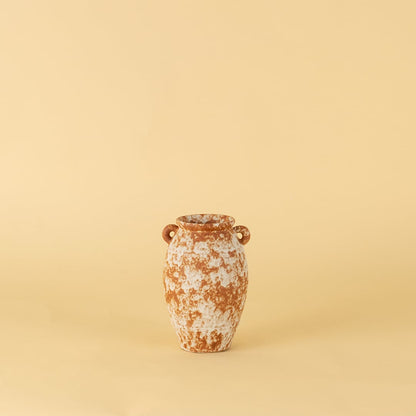 Handcrafted terracotta ceramic vase with dual handles in rustic orange white textured finish for modern home decoration.