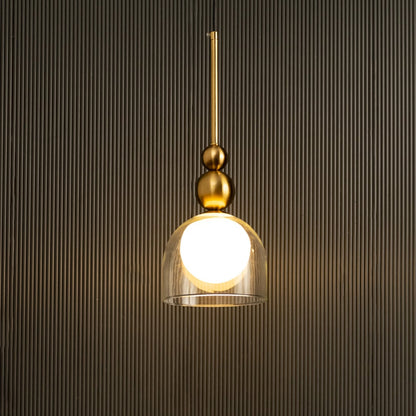 A modern gold pendant with a white globe ideal for LED chandelier lighting and elegant contemporary interior décor suited for sophisticated home design.