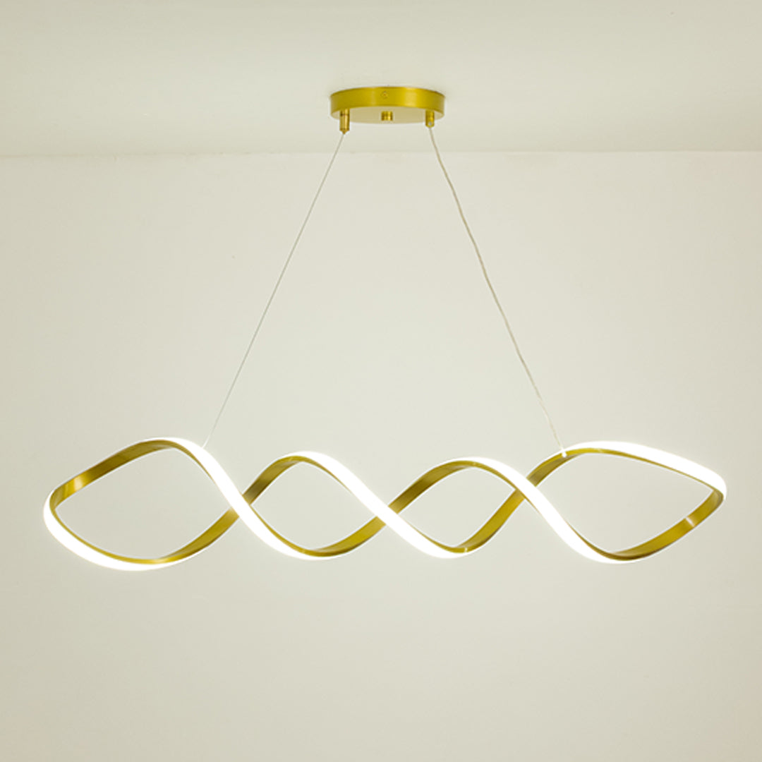 Gold metal wave LED pendant light with integrated illumination creating artistic modern ambient ceiling lighting indoors.