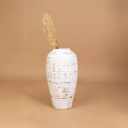 White rustic decorative vase placed in a curated room setting enhancing consoles shelves and living spaces with natural artistic decor.