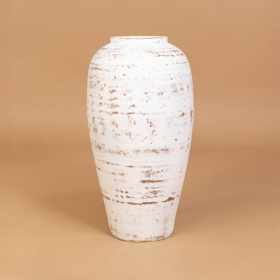 Decorative ceramic vase in off white finish with textured pattern for table decor or shelf styling modern home placement neutral background.