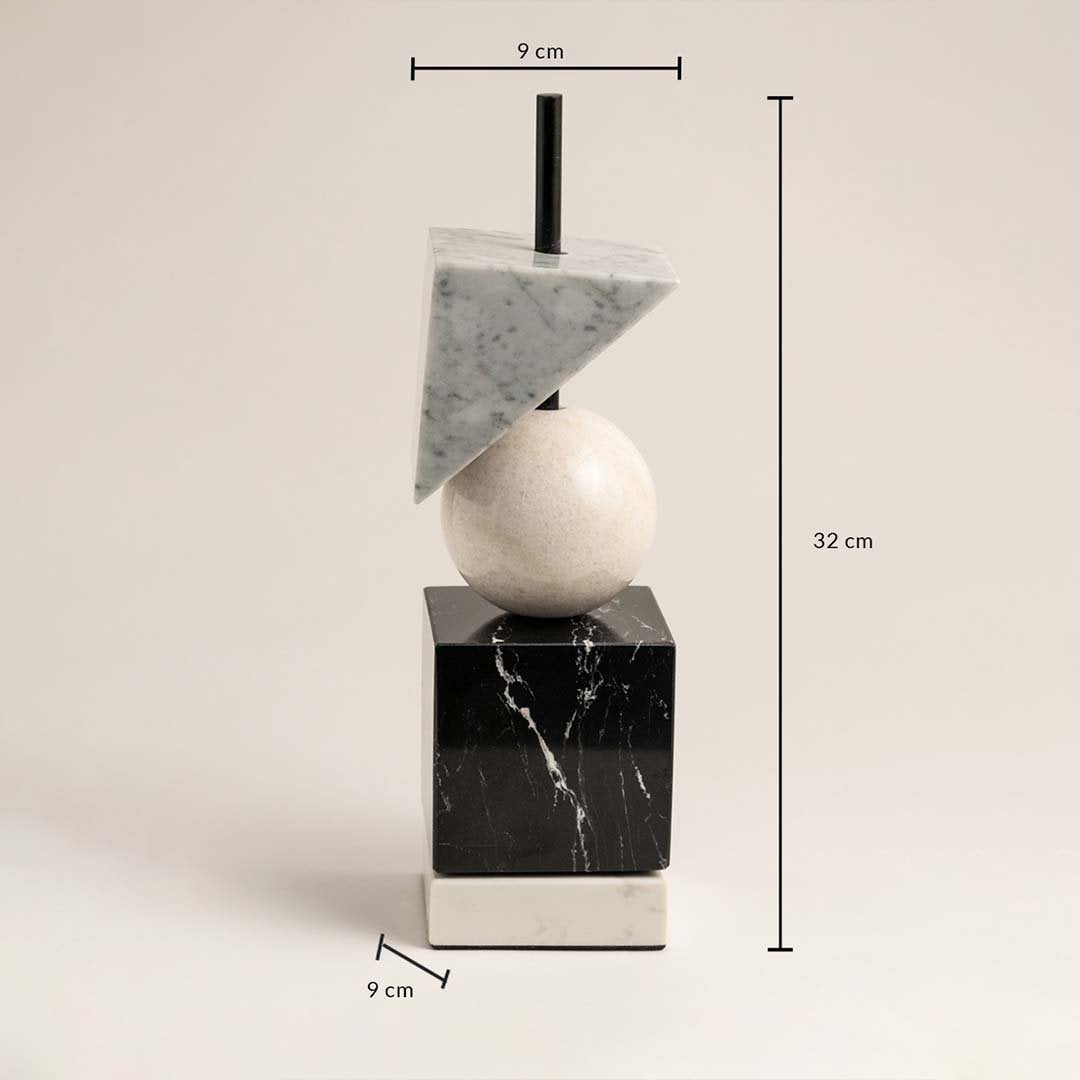 Marble geometric sculpture shown in 32 cm height 9 cm width and 9 cm depth for accurate home decor reference.