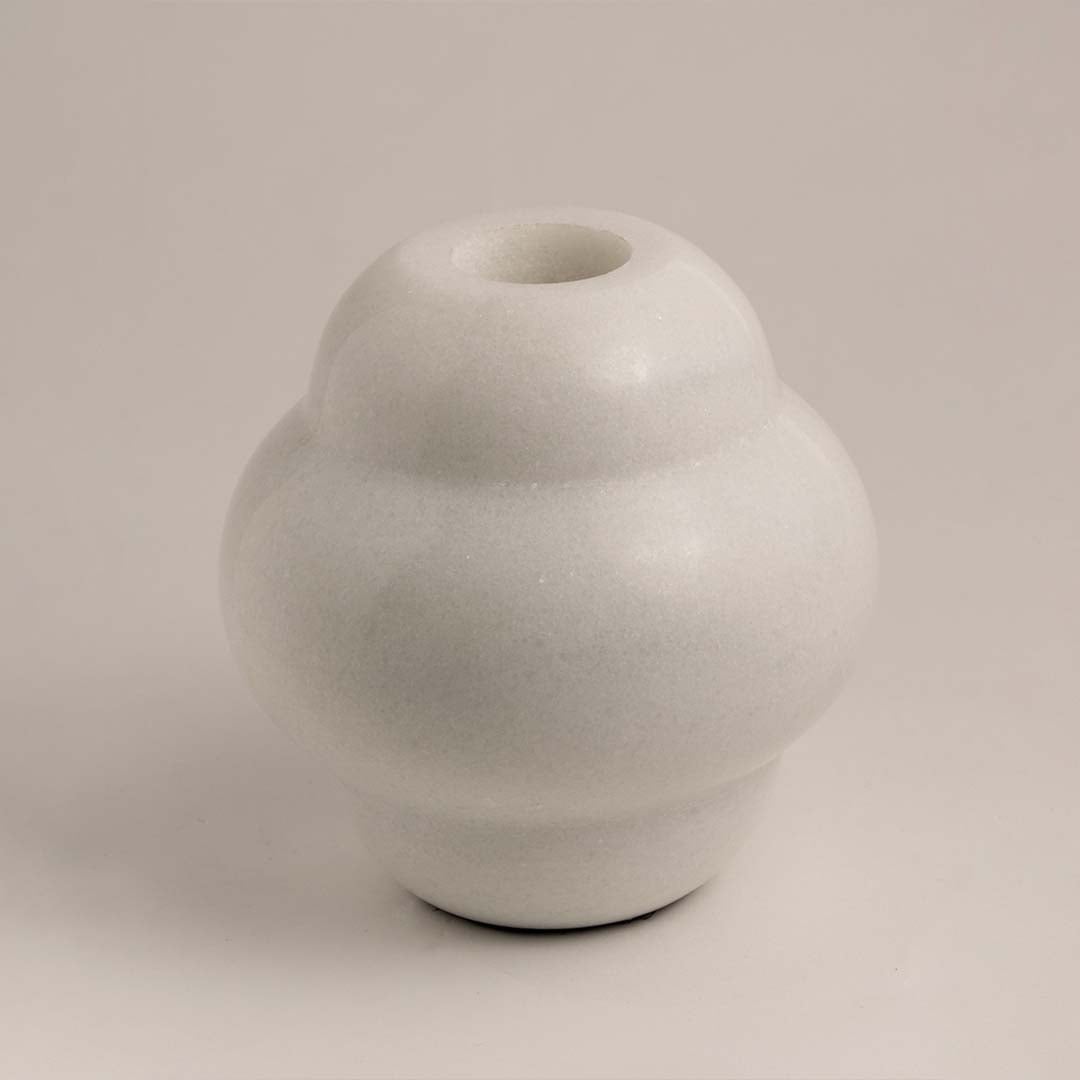 Modern ceramic vase with smooth matte white finish displayed on white background ideal for minimal shelf and table decor.