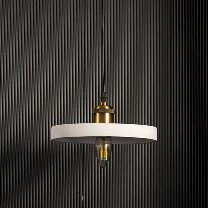 White ring pendant light turned off with visible bulb and elegant circular frame on black background.