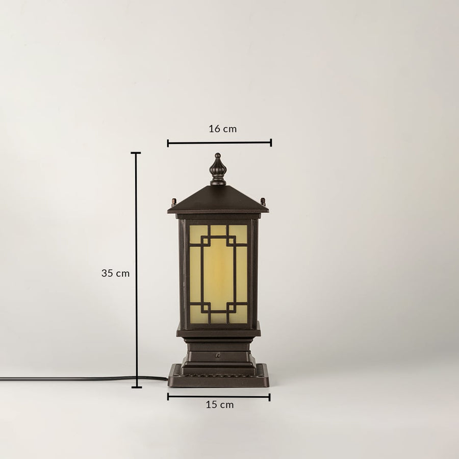Black traditional post lantern Dimensions Image $34 \text{ cm}$ height $17 \text{ cm}$ top width $15 \text{ cm}$ base width.