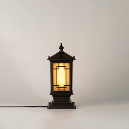 Vintage black outdoor gate light with glowing glass panels for luxury exterior decor styling use.