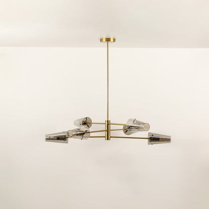 Clear glass shade chandelier with gold metal frame designed for elegant modern ceiling lighting in contemporary interiors.