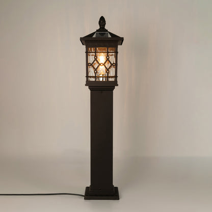 Vintage black solar outdoor gate light with glowing panels for luxury exterior decor styling use.