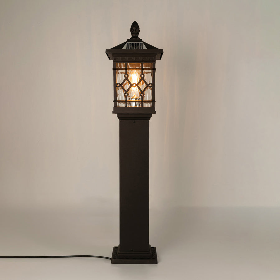 Vintage black solar outdoor gate light with glowing panels for luxury exterior decor styling use.