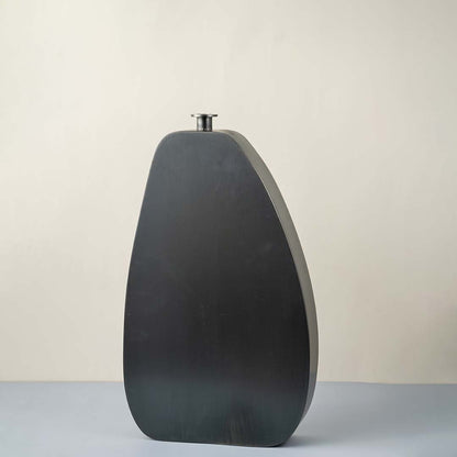 Charcoal grey ceramic decorative vase with organic silhouette for contemporary tabletop styling and home decor displays.