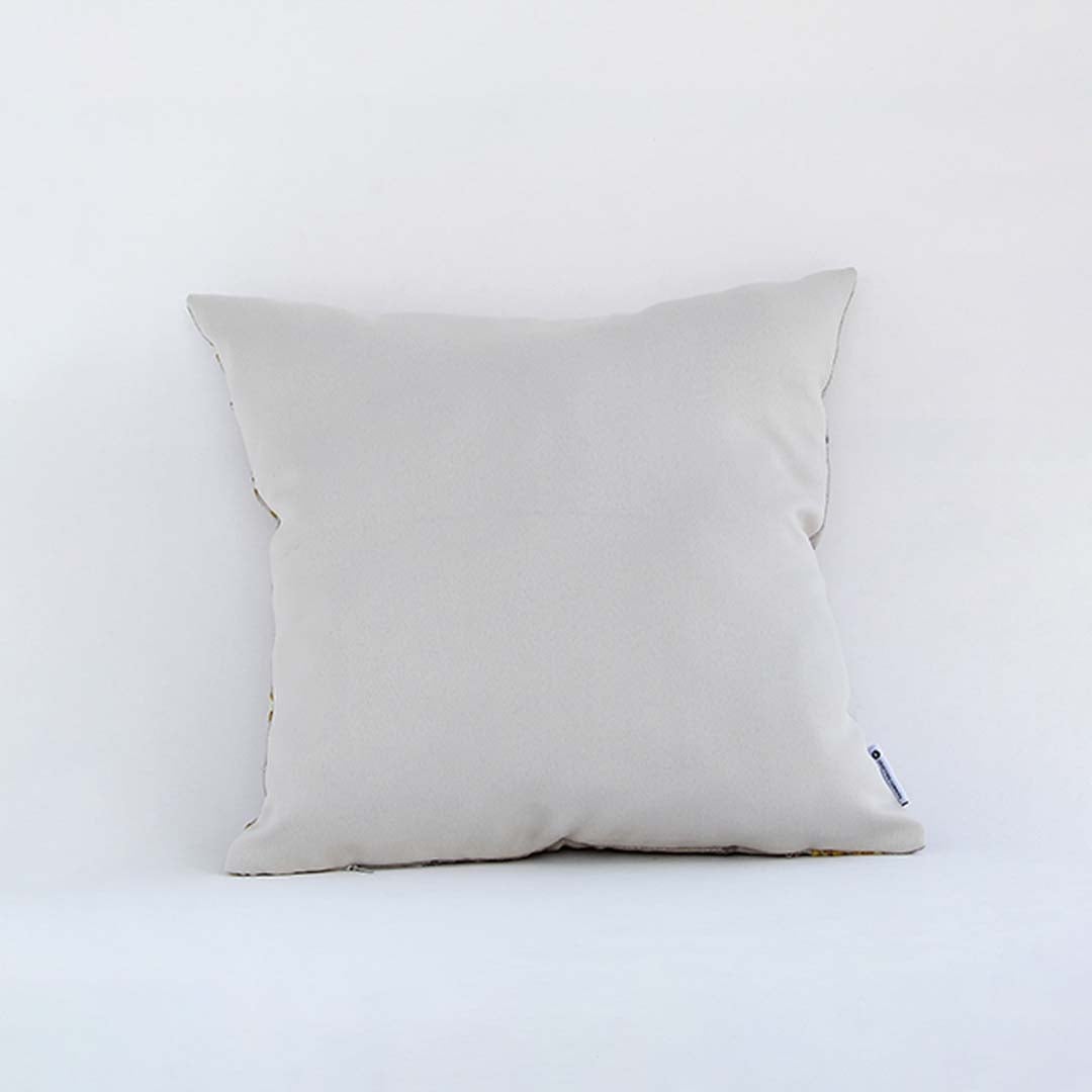 Backside of the cushion cover in soft beige cotton fabric displayed in a clean minimal view offering a breathable gentle and skin friendly texture ideal for modern home décor styling.