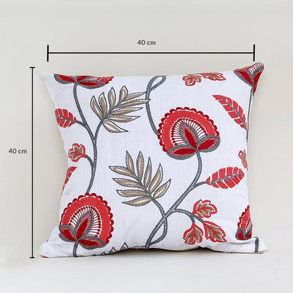 Soft cotton cushion cover with detailed red floral embroidery displayed with dimensions of 40 cm by 40 cm offering a vibrant nature inspired décor touch with a breathable gentle skin friendly feel.