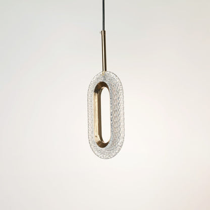 Modern gold metal pendant light with oval frame and crystal diffuser designed for luxury spaces.