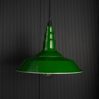 Green metal pendant light with golden holder shown against black background perfect for modern home lighting