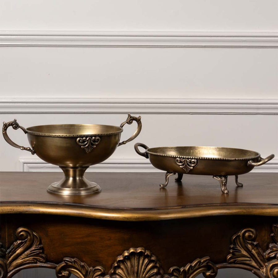 Set of brass decorative pedestal bowls with ornate handles antique finish centerpiece accents for dining table and home styling.