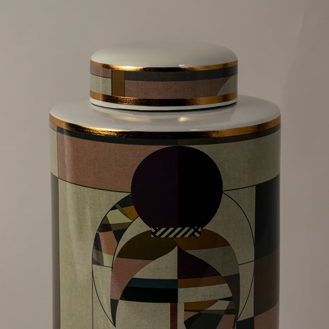 Closeup of Abstract Face ceramic jar showing intricate geometric pattern and fine gold detailing around the edges.